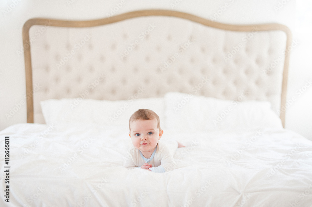Baby boy in large bed Baby boy in large bed