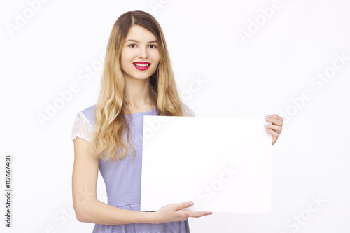 happy woman holding white blank paper