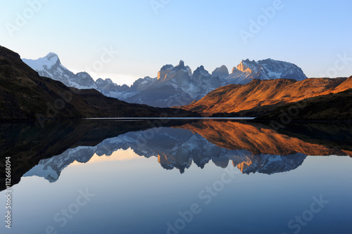 Torres del Paine reflected in the Rio Paine from the Weber Bridge. photo
