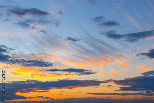 orange, blue and yellow colors sunset sky