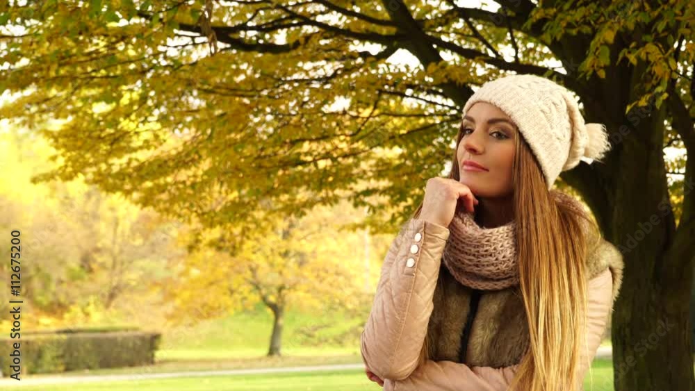 Woman relaxing enjoying autumn fall park 4K. Woman relaxing enjoying autumn fall park 4K.
