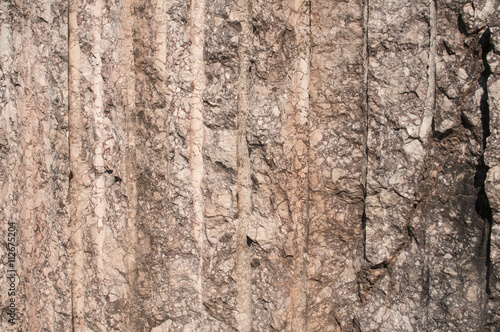 Surface of marble block cut in quarry closeup as background