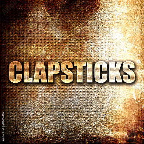 clapsticks, 3D rendering, metal text on rust background photo