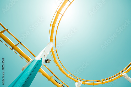Low angle view of roller coaster tracks