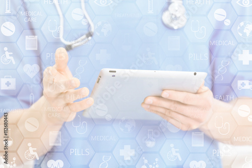 Medicine doctor working with modern digital tablet-pc. Medical network concept