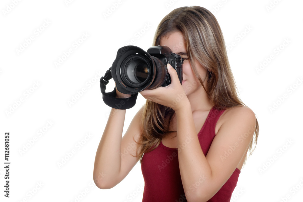 Teenager taking photographs with a professional camera Teenager taking photographs with a professional camera