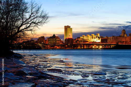 Albany NY skyline at night reflections off the Hudson River