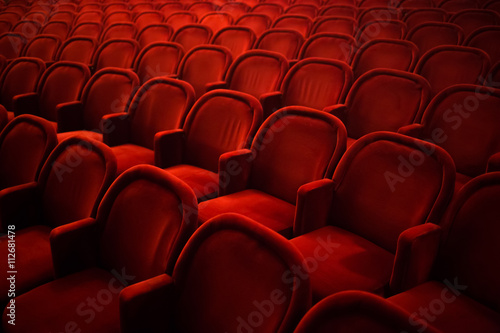 Rows of empty red seats in cinema or theater