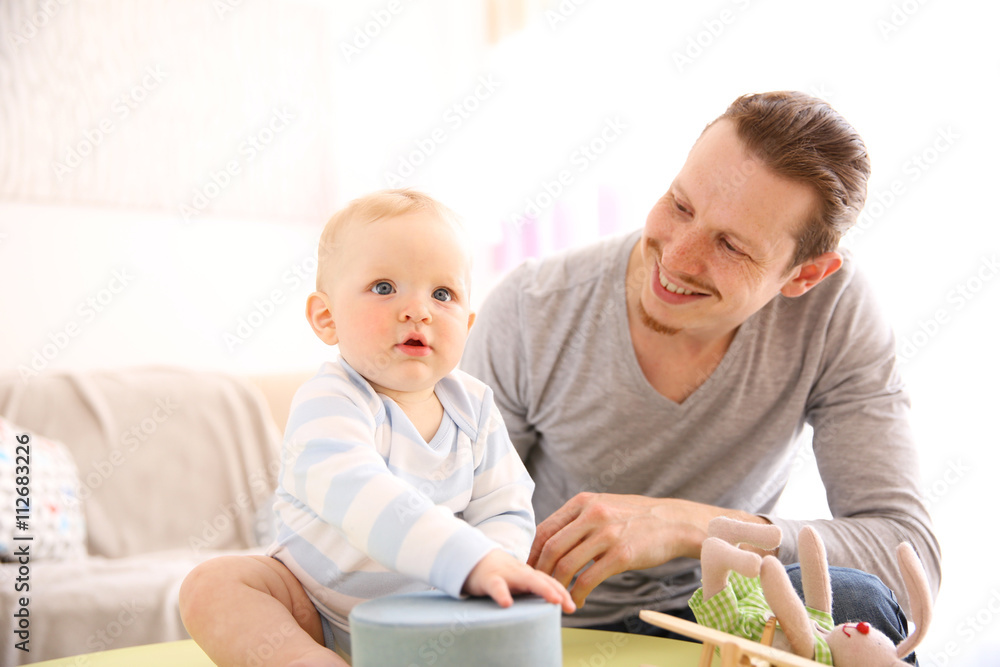 Young father having fun with his little son Young father having fun with his little son