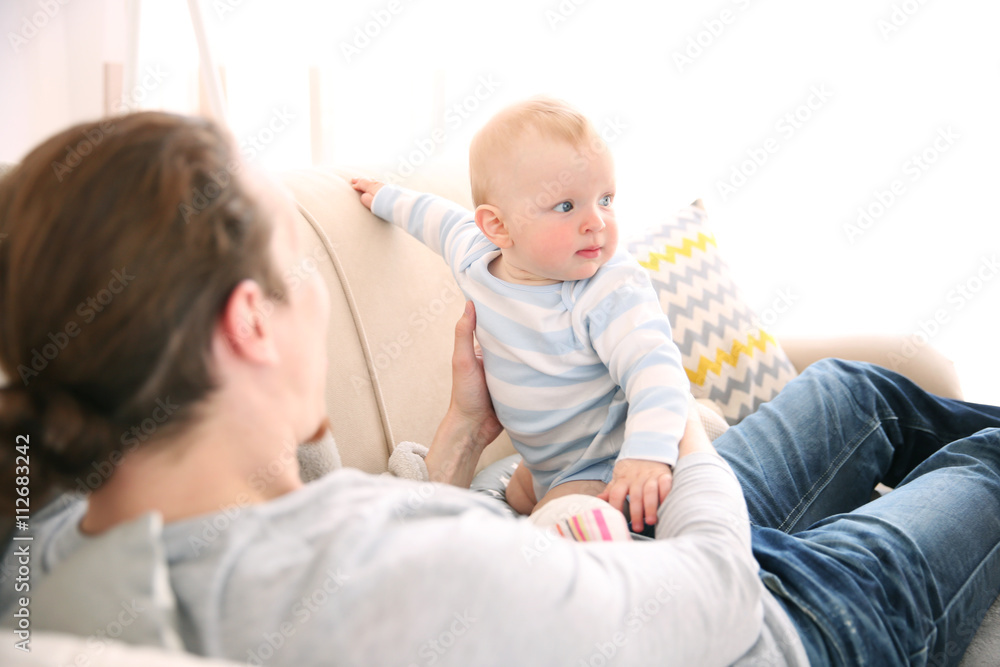 Young father having fun with his little son Young father having fun with his little son