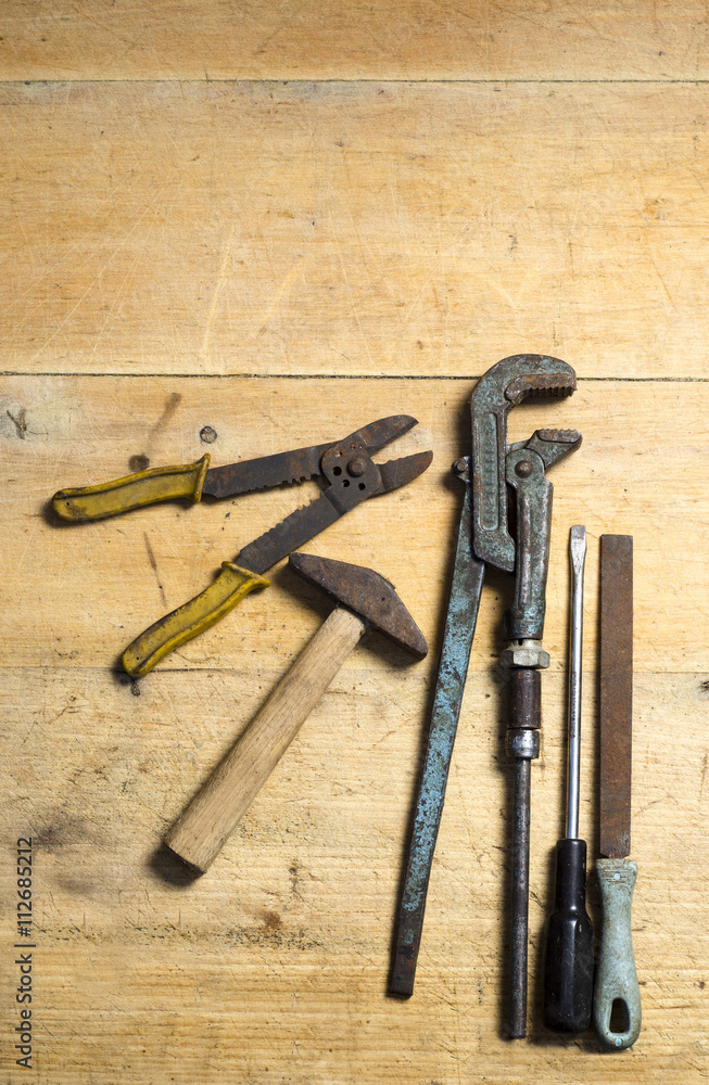 Tools on plank, wooden background rusty tools. Copy space Tools on plank, wooden background rusty tools. Copy space