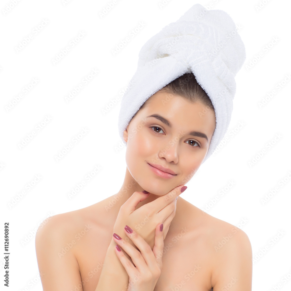 Beautiful woman with a towel on her head. Beautiful woman with a towel on her head.