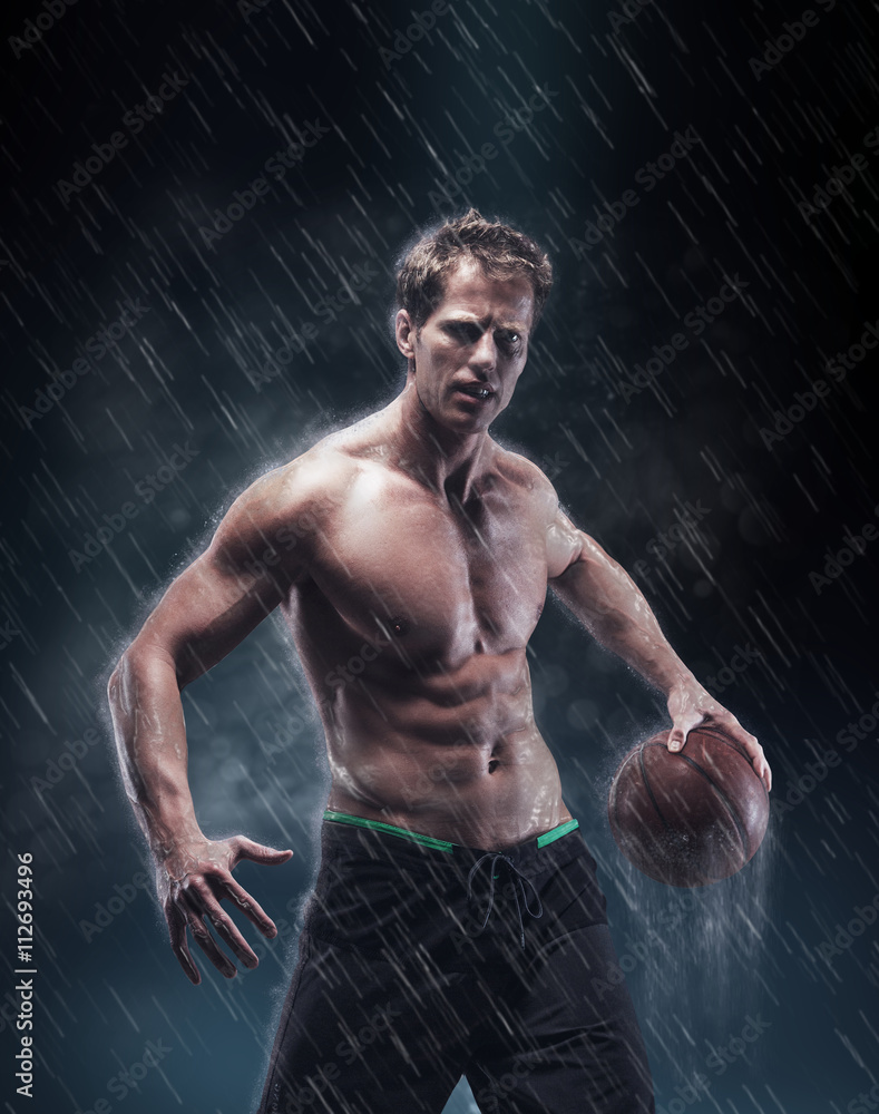Fototapeta premium Portrait of shirtless wet bascetball player.