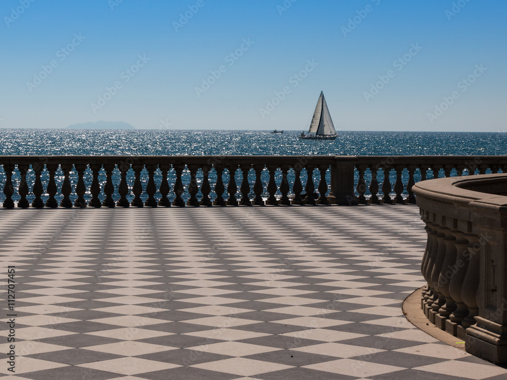 Livorno' s Mascagni Terrace and White Sailing Boat in Background