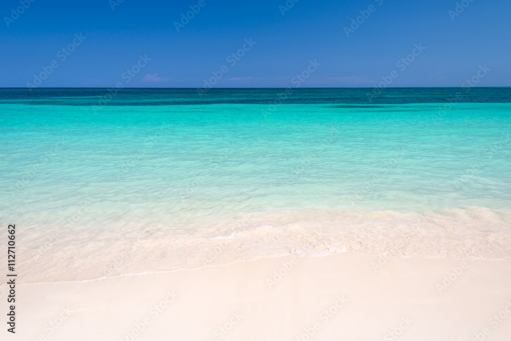 Sand and caribbean sea background