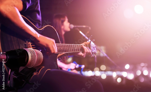 Fotografia Guitarist on stage for background, soft and blur concept