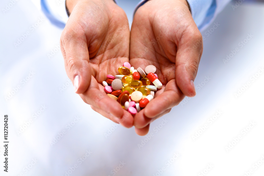 packing pills male doctor stretches in hand packing pills male doctor stretches in hand