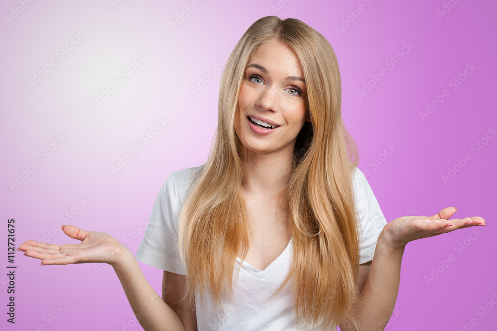 smiling young woman pointing