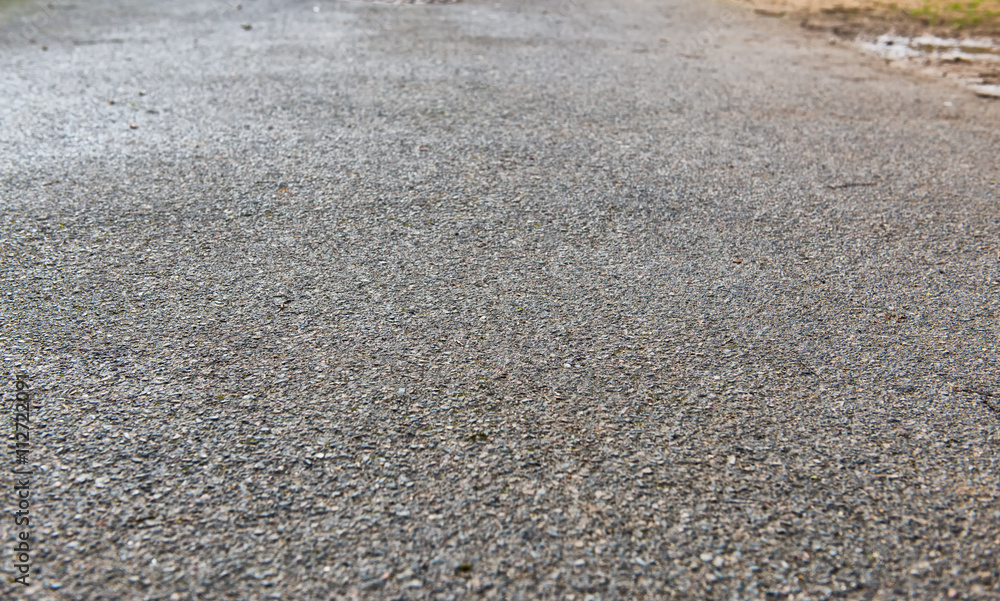 Closeup of paved road. Road stone texture Closeup of paved road. Road stone texture