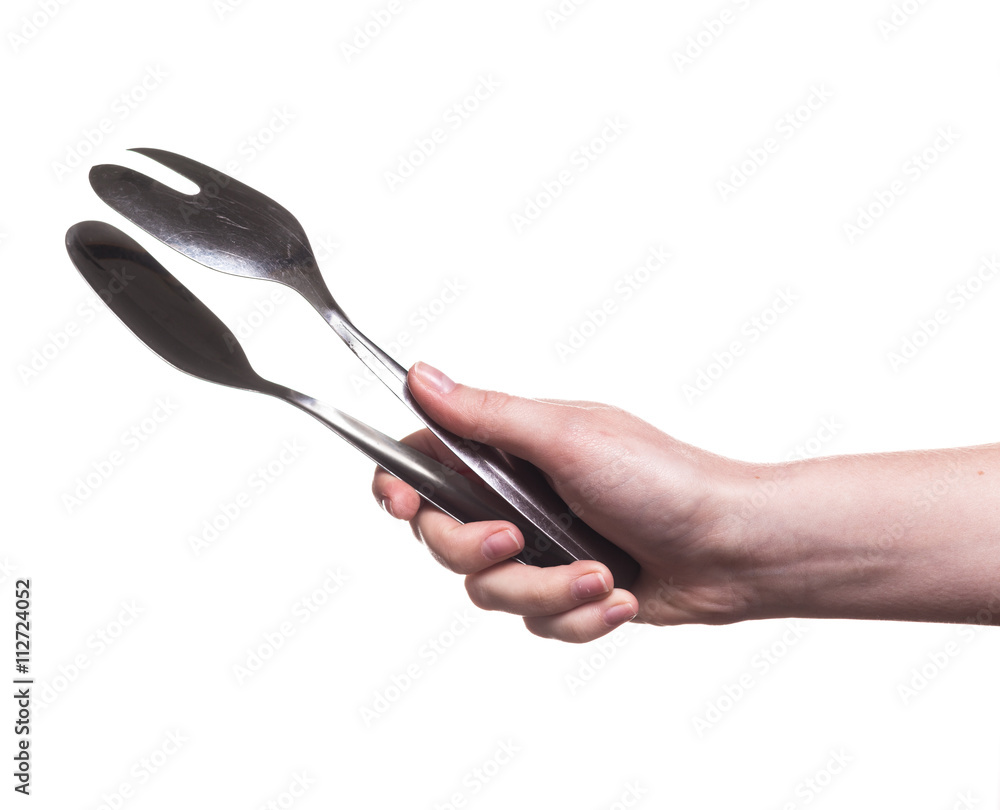 kitchen utensils in the hand of women isolated on white background kitchen utensils in the hand of women isolated on white background