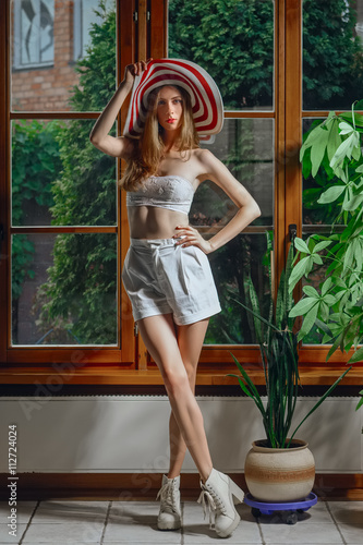 pretty fashion model with big hat © boomeart