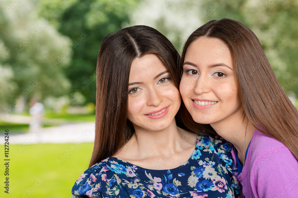Obraz premium Young Adult Mixed Race Sisters/ Friends. Portrait
