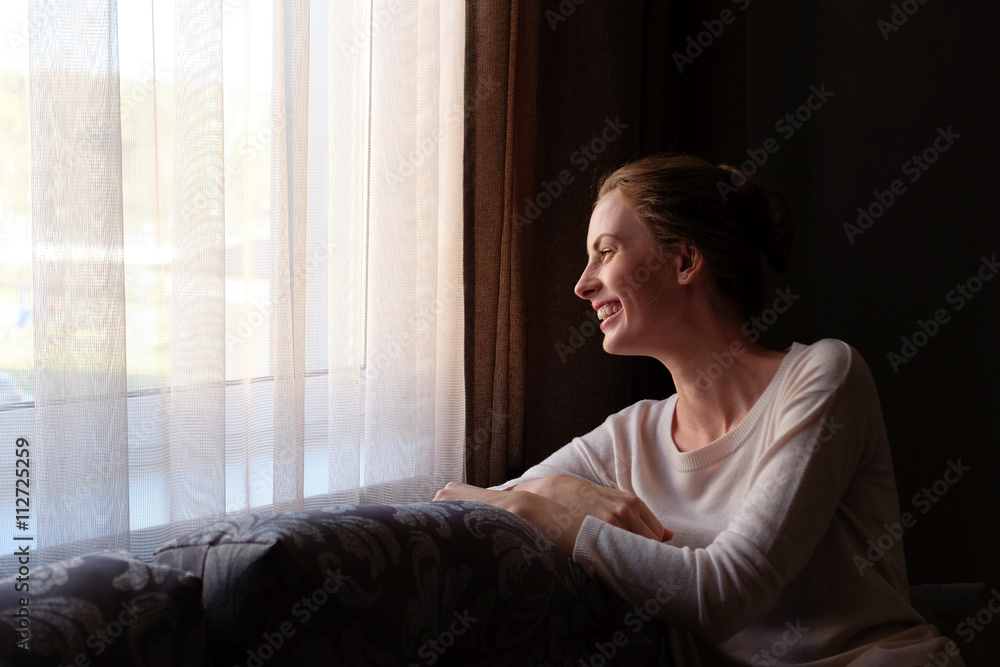 pretty lonely lady on sofa near window pretty lonely lady on sofa near window