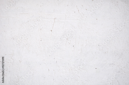 Background With White Plaster Wall With Uneven Surface