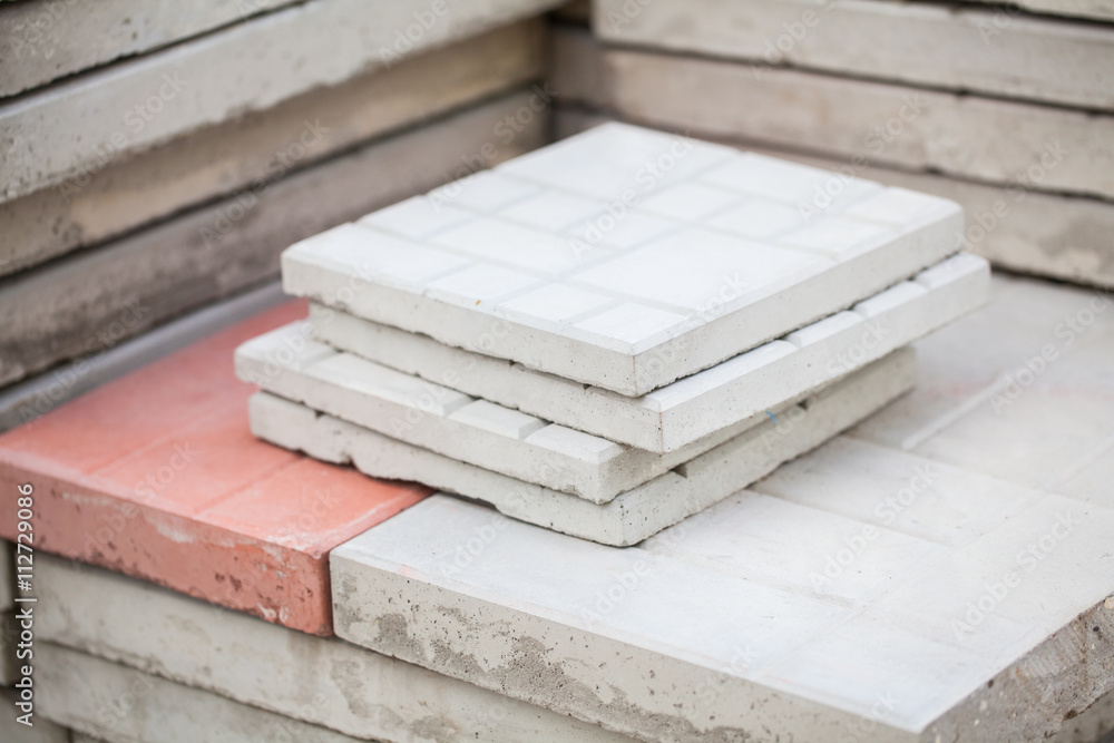 Pile of concrete square blocks for exterior paving