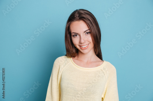 Close-up portrait of a casual girl looking at camera