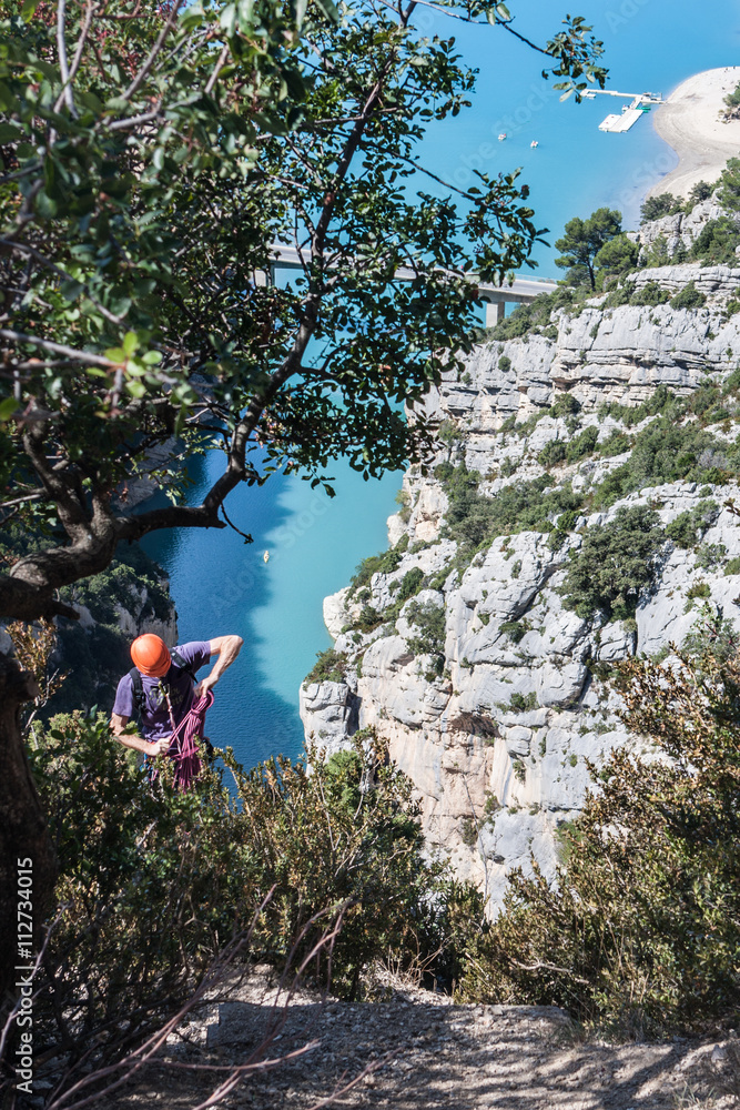 Brave rock-climber in a Verdon Gorge, Provance, France Brave rock-climber in a Verdon Gorge, Provance, France
