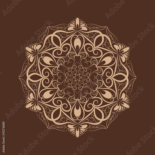 Flower mandala over dark brown