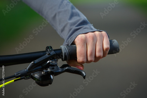 Woman hands on modern sport bike