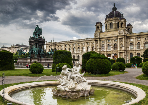 Beautiful view of famous Kunsthistorisches Museum with park and sculpture in Vienna, Austria.
