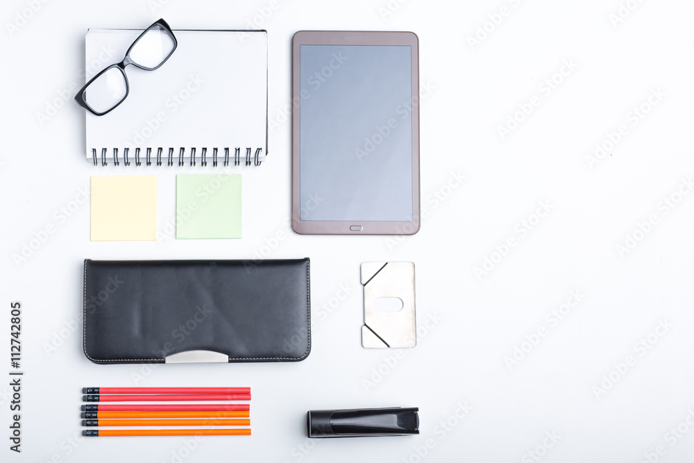 Blank office desk background with copy space for your text. Top view. Business and office supplies with modern digital tablet. Blank office desk background with copy space for your text. Top view. Business and office supplies with modern digital tablet.