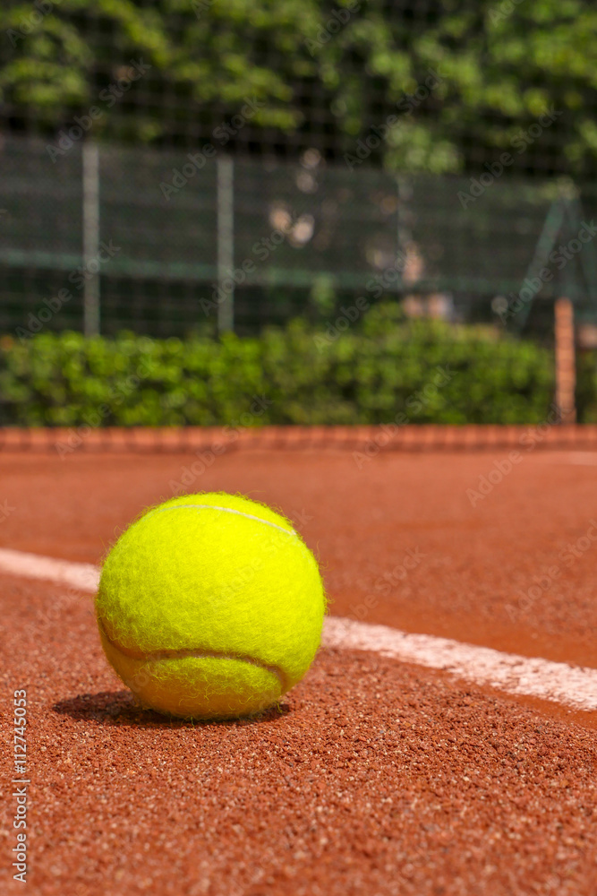 Tennis equipment on clay court