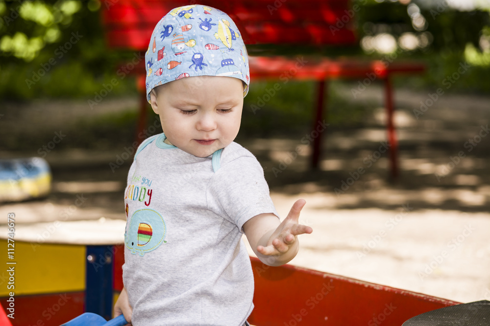 child playing in the sandbox on the playground child playing in the sandbox on the playground