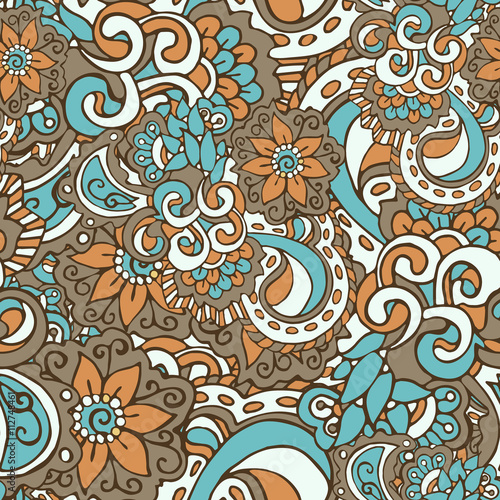 Bright seamless pattern in doodle style, colored in blue, brown, pale and white pastel shades. Hand-drawn elegant vector ornament.