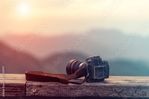 Travel photographer equipment with beautiful landscape on the ba © narathip12
