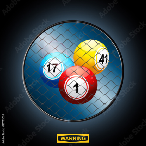 Bingo balls in a border cage and warning sign