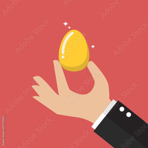 Hand with golden egg