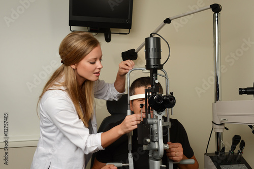 Eye Doctor examinating a patient
