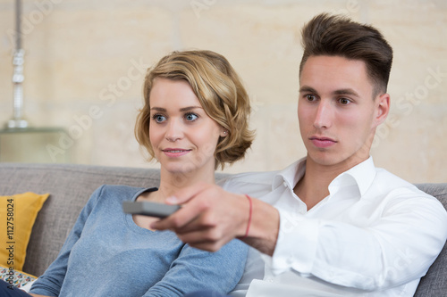 couple choosing next vacation on internet