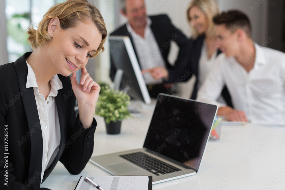 young businesswoman working in office