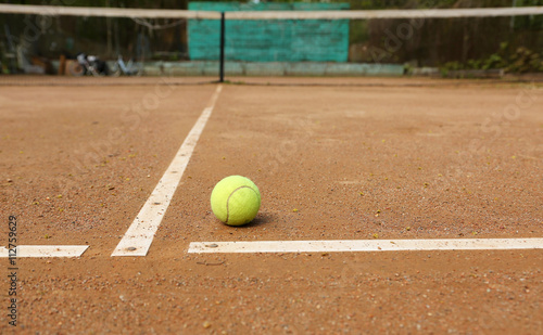 Tennis ball on tennis court © Chekunov Alexandr