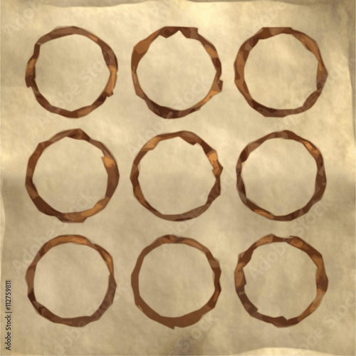 Set of Coffee stains on paper texture. Coffee cup prints. Vector illustration.