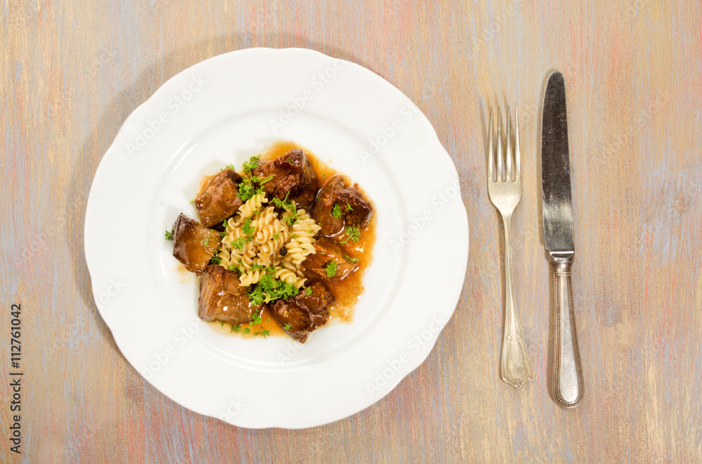 beef goulash with pasta and parsley beef goulash with pasta and parsley