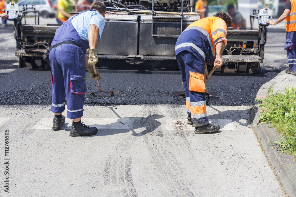Workers on Asphalting Road Workers on Asphalting Road