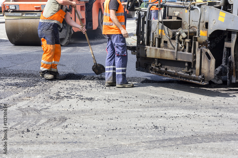 Workers on Asphalting Road Workers on Asphalting Road