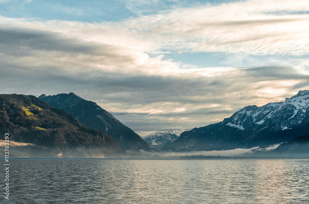 The Swiss Alps and the lake in the early morning
